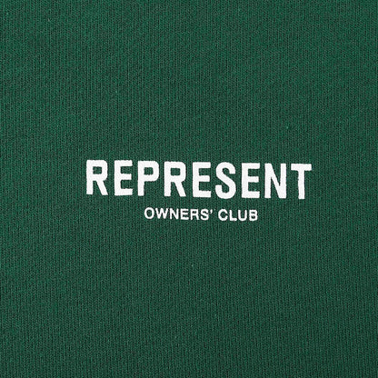 Green knit fabric with "REPRESENT" and "OWNERS' CLUB" printed text