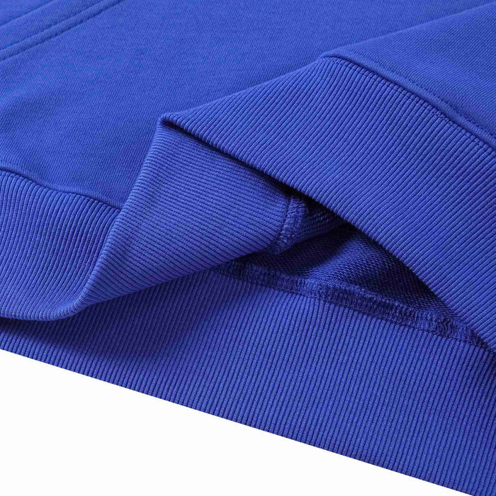 Blue hoodie sleeve cuff with ribbed knit hem and overlock stitching