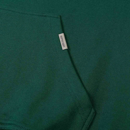 Green hoodie with small fabric label tag at side seam