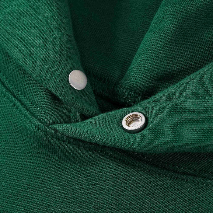 Green hoodie front placket with metal snap buttons and stitched edge