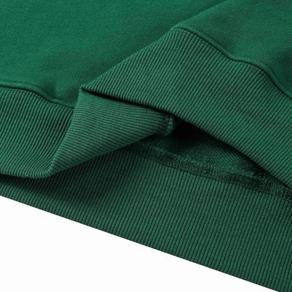 Green hoodie ribbed cuff and hem seam detail