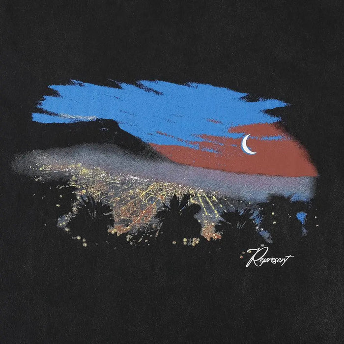 Black graphic T-shirt close-up of blue and orange landscape print