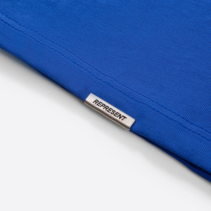 Blue T-shirt hem with interior size label