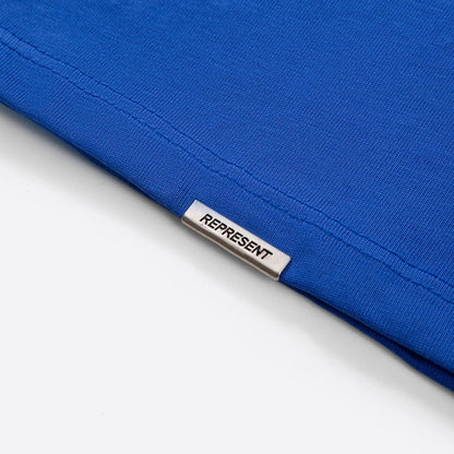 Blue T-shirt hem with interior size label