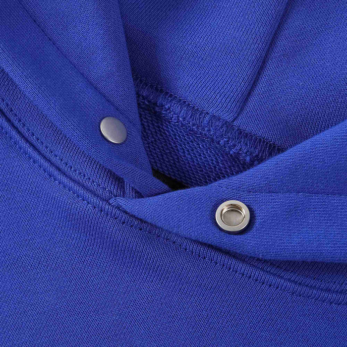 Blue hoodie neckline with snap buttons and ribbed trim