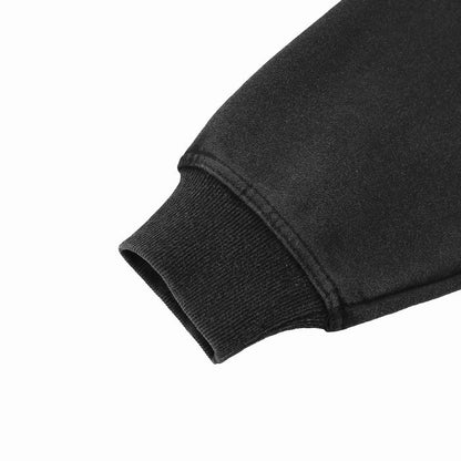 Black hoodie sleeve cuff with ribbed knit hem detail