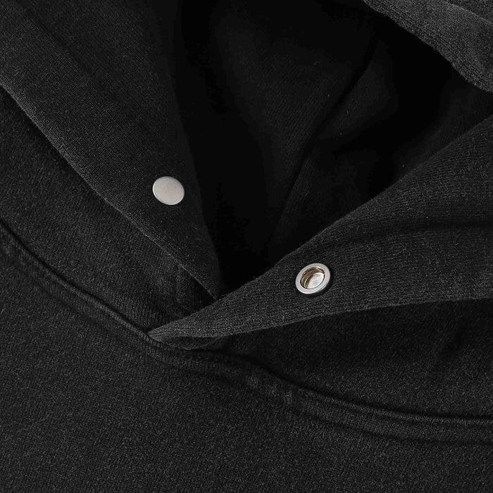 Black hoodie front neckline with metal snap and hood lining