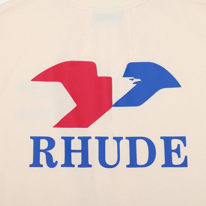 Cream T-shirt chest logo graphic in red and blue