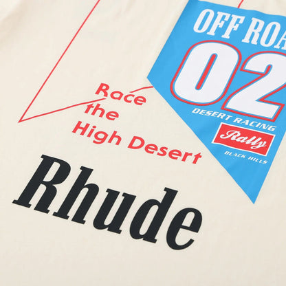 Beige Rhude T-shirt chest graphic reading “Race the High Desert” and “Off Road 02”