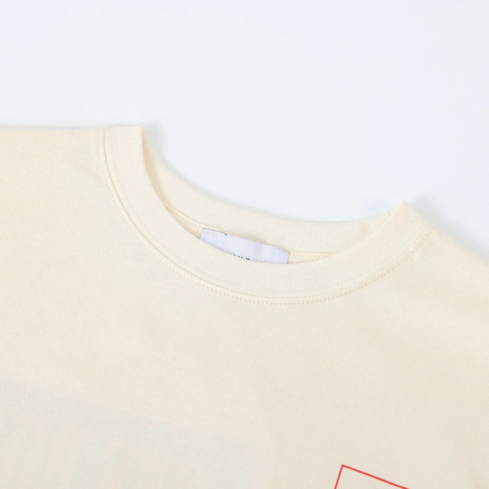 Beige crewneck T-shirt collar with ribbed trim and part of interior label