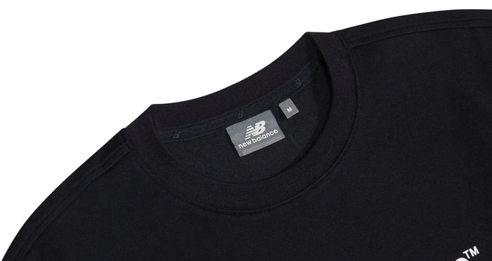 Black T-shirt with ribbed crew neck and New Balance tag