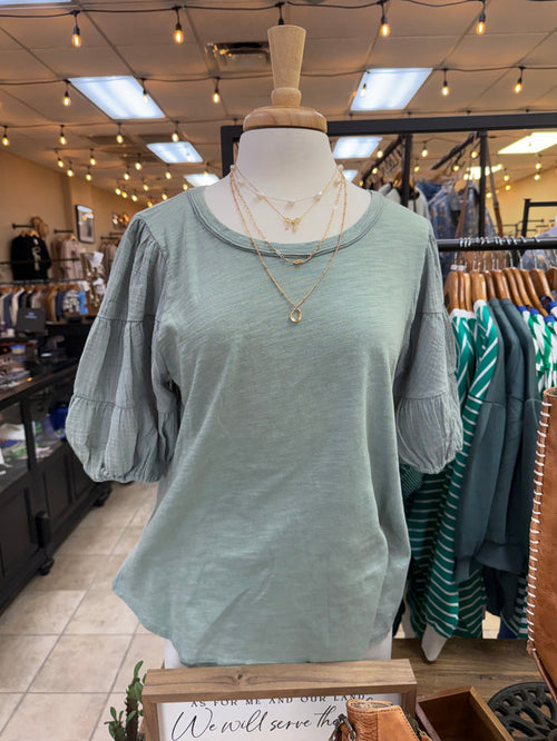 Sage green crew-neck mineral-wash T-shirt with roomy puff sleeves