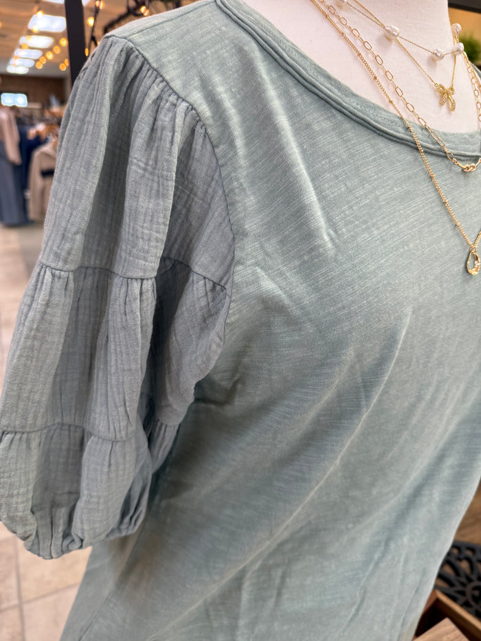 Sage green crew-neck T-shirt with gathered puff sleeves and mineral-wash texture