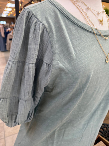 Sage green crew-neck T-shirt with gathered puff sleeves and mineral-wash texture