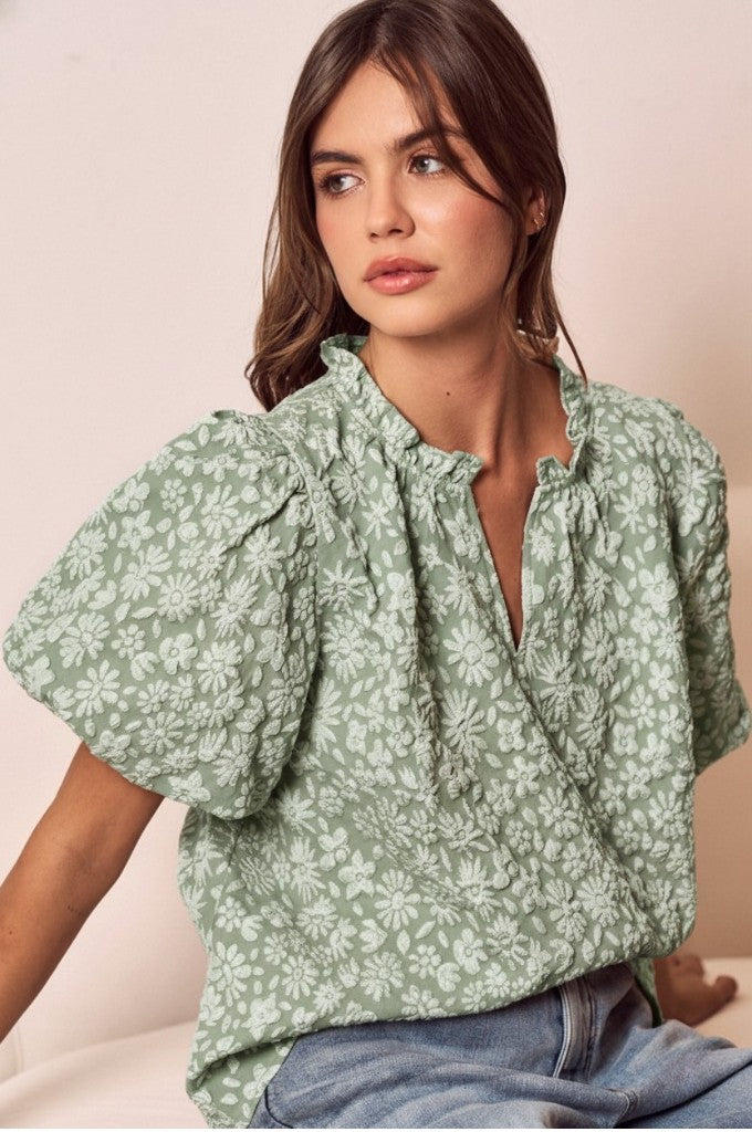 Sage textured floral shirt with short puff sleeves and V-neck, light green print