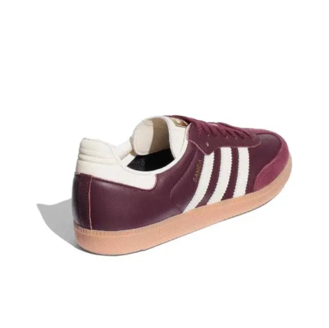 Adidas Samba OG low-top sneaker with maroon upper, white stripes, and gum sole