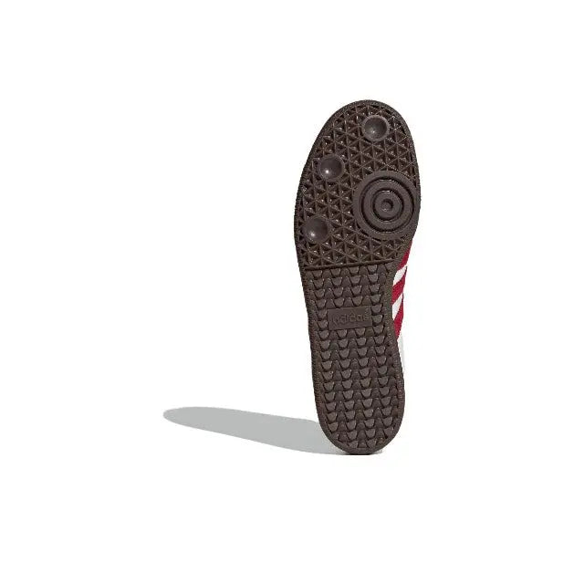 Adidas Samba OG outsole, dark textured rubber tread with circular pattern detail