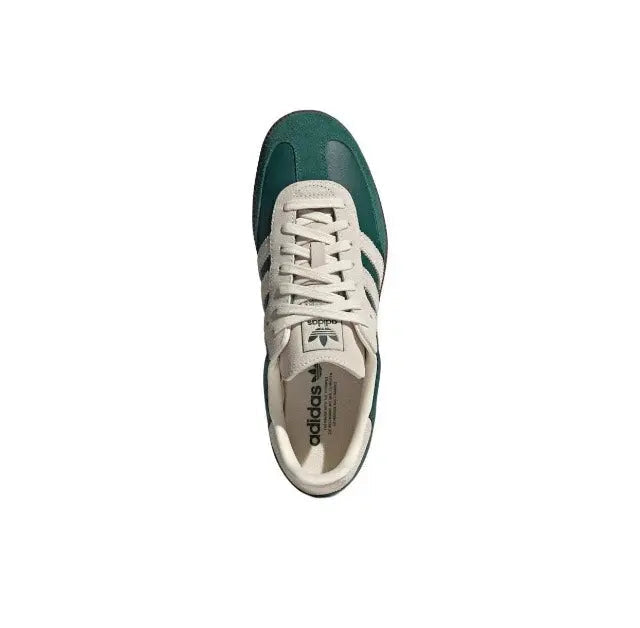 Adidas Samba OG low sneakers, side view with cream laces and green heel