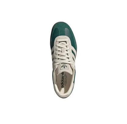 Adidas Samba OG low sneakers, side view with cream laces and green heel