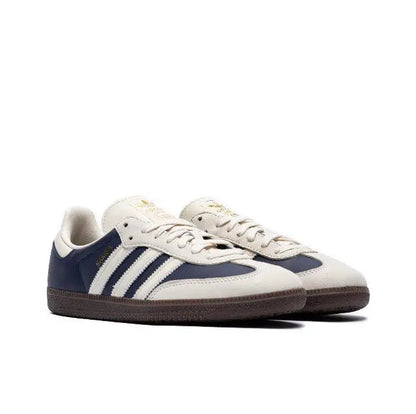 Adidas Samba OG sneakers with white upper, navy side panel, lace-up front