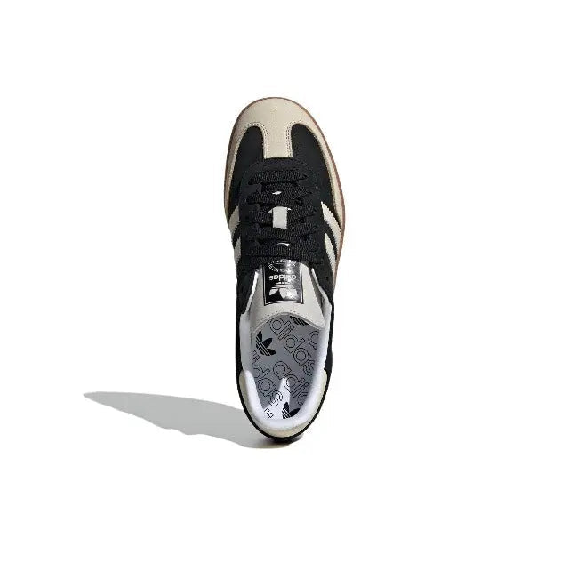 Adidas Samba OG sneakers front view, black upper with white stripes