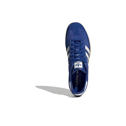 Blue lace-up sneaker with white side stripes and logo tongue