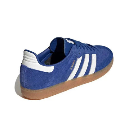 Blue suede sneaker with white heel panel, gum-brown outsole edge