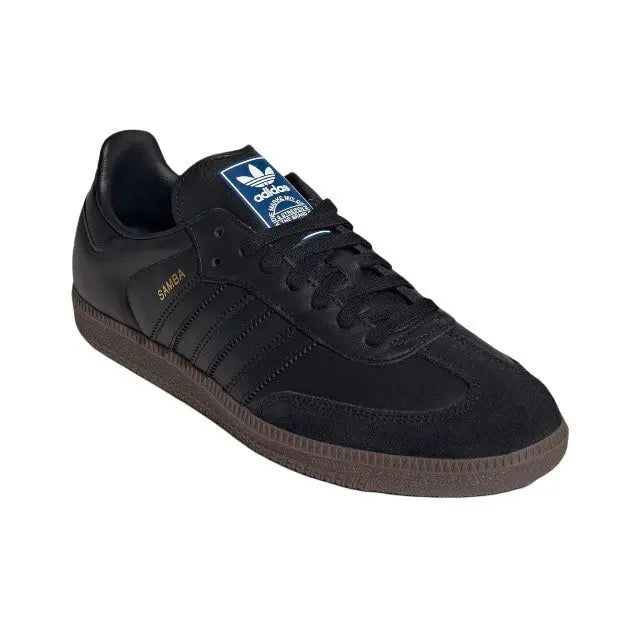 Adidas Samba OG sneakers, black lace-up upper with blue tongue label and gum-brown sole