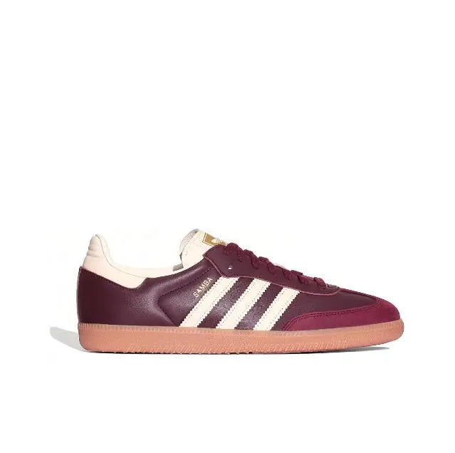 Adidas Samba OG sneaker side view, maroon upper with white stripes and gum sole