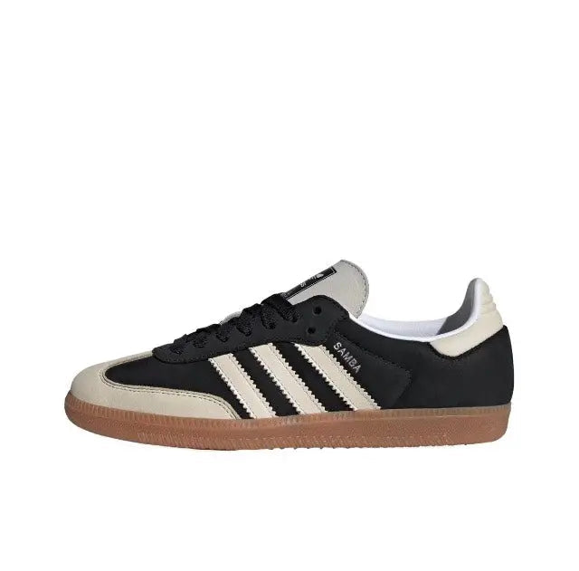 Adidas Samba OG sneakers side view, black-and-cream with white stripes