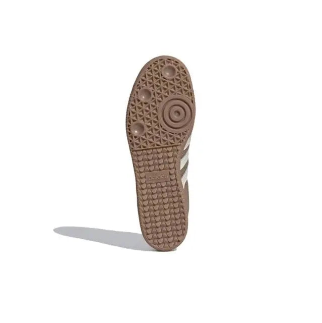 Samba OG sneaker outsole view with textured rubber tread and white stripe detailing