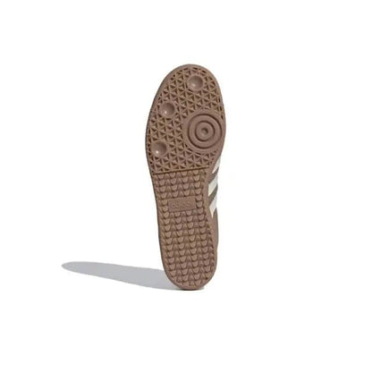 Samba OG sneaker outsole view with textured rubber tread and white stripe detailing