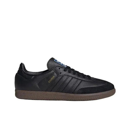 Adidas Samba OG sneakers, black leather low-top with gum-brown sole, side view