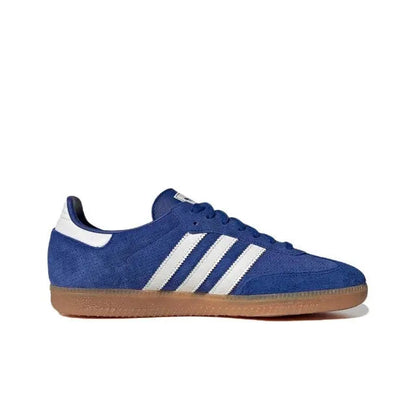 Blue suede sneakers with white triple stripes, white heel lining and gum sole