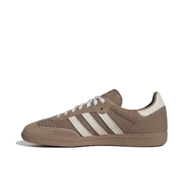 Adidas Samba OG sneaker side view, brown upper with white stripes and laces