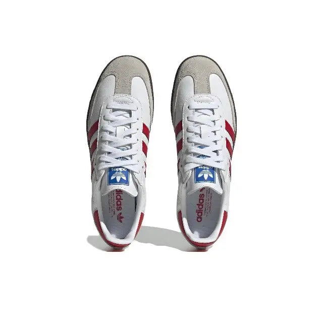 Adidas Samba vegan sneakers, white uppers with red heel accents and white laces