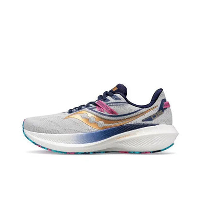 Light gray running shoe with navy heel, gold logo, pink lace accent, white midsole