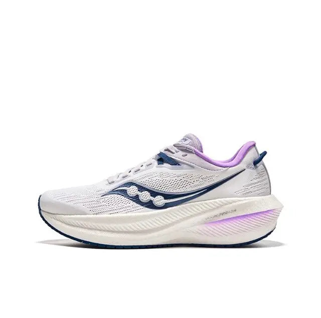 White running shoe with indigo logo and purple collar, cushioned midsole