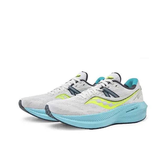 Pair of light gray running shoes with neon yellow accents and light blue midsoles