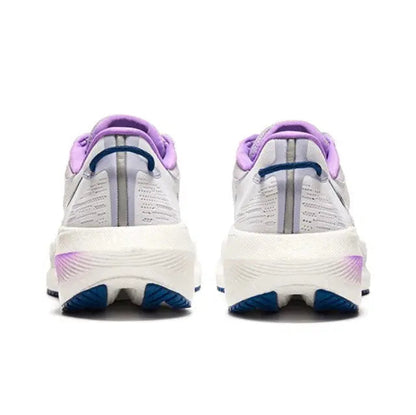 Pair of white running shoes with purple heel tabs and indigo accents