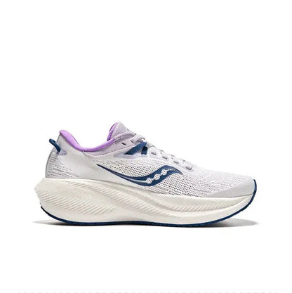 White running shoe with indigo side logo, purple lining, and thick foam sole