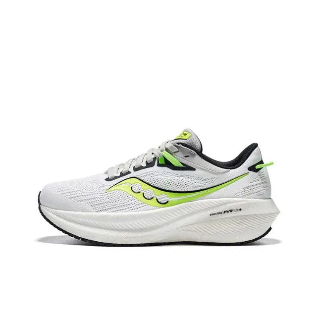 Saucony Triumph 21 running shoes in white with neon green and black accents, side view
