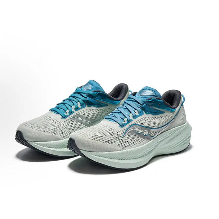 Light gray and teal lace-up running shoes, side view, with textured mesh upper