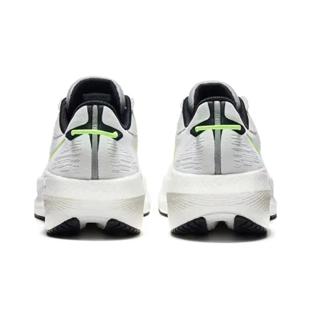 Saucony Triumph 21 running shoes back view, white with neon green stripes and black heel