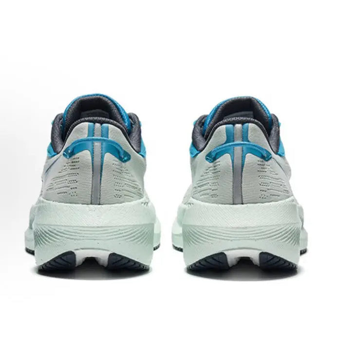 Pair of light gray running shoes, rear view, with blue collar and heel tab