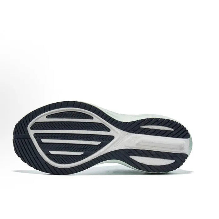 Running shoe outsole with dark tread pattern and white midsole edge