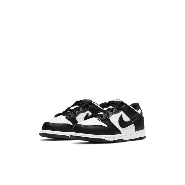 Low-top skate sneaker pair, black and white overlays, Swoosh side and lace-up