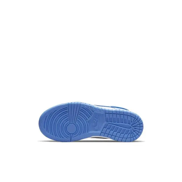 Blue rubber sneaker outsole with tread and circular traction pattern