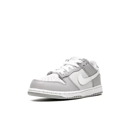 Nike SB Dunk Low low-top sneaker with white panels, gray collar, and swoosh