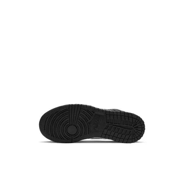 Skate sneaker outsole, black rubber tread with circular and grid patterns